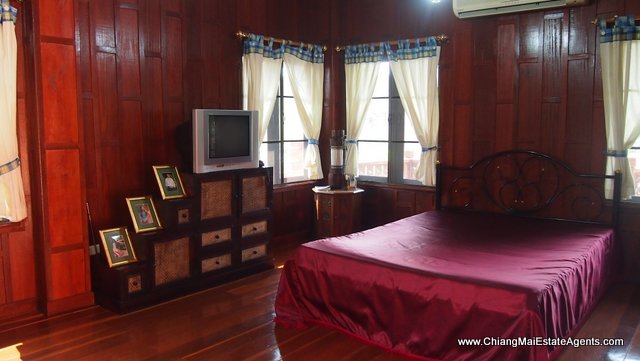 Traditional Lanna Style Home in Modern Moo Baan