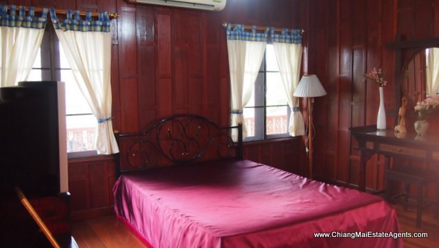 Traditional Lanna Style Home in Modern Moo Baan