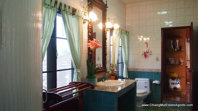 Traditional Lanna Style Home in Modern Moo Baan