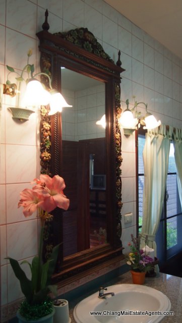 Traditional Lanna Style Home in Modern Moo Baan